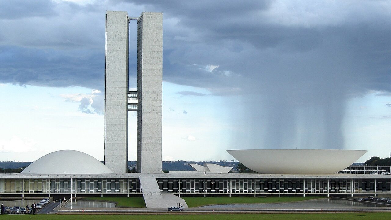 Stand-in: Brazil's National Congress buildings in Brasília under a rain shower in a January 2006 file photo, not a photo of the election or either candidate
