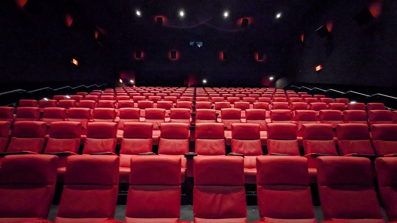 Stand-in: rows of empty red seats in a movie theater in a January 2025 file photo, not a still from any release