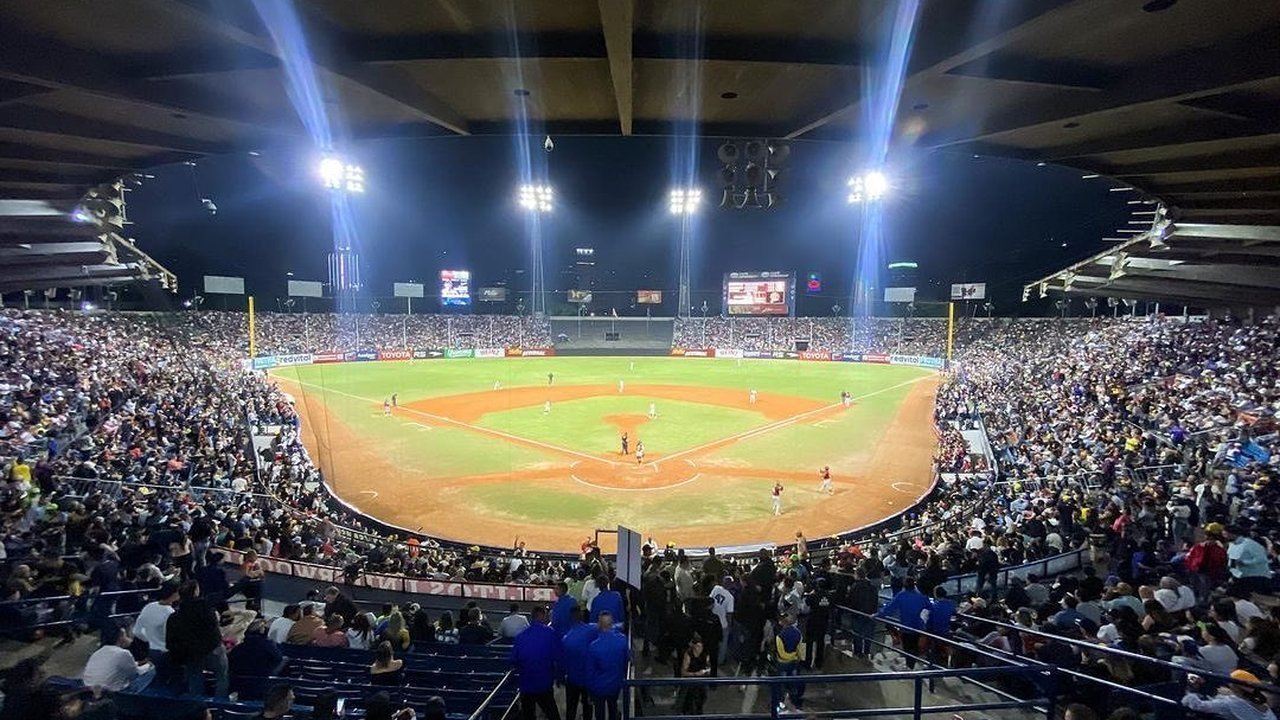 Stand-in: a night game at the Estadio Universitario baseball stadium in Caracas in a January 2023 file photo, not a youth game or quake damage